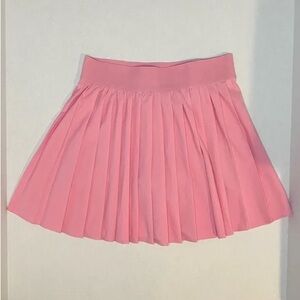 Pink pleaded skirt with shorts under